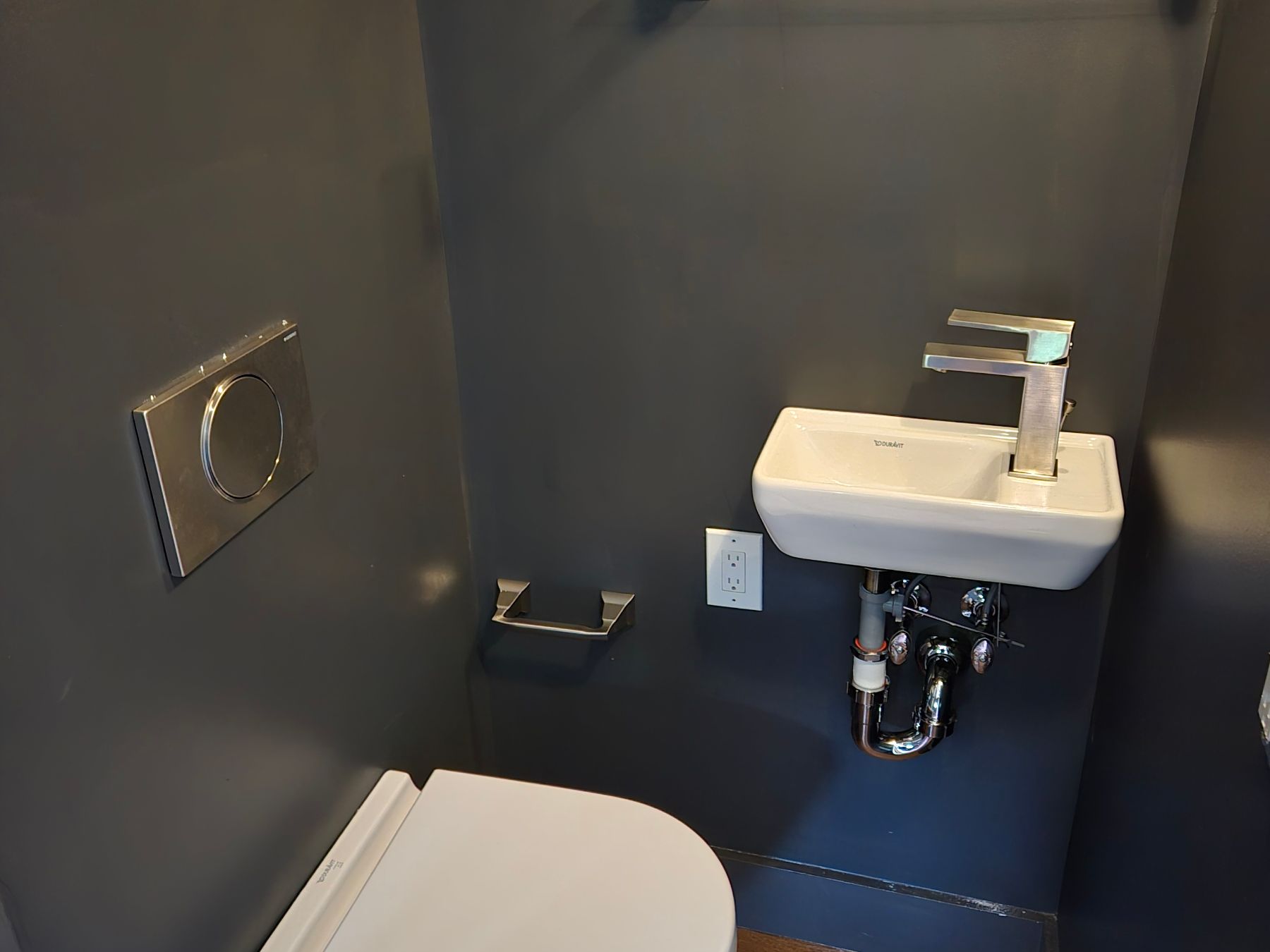 Finished bathroom with new sink and fixtures