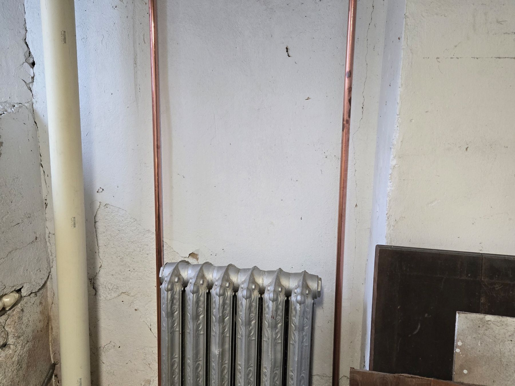 Cast-iron radiator connected to a heating system