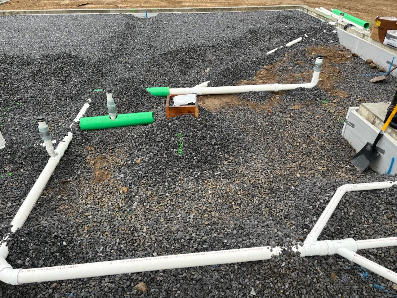 PVC drainage layout set out before backfilling
