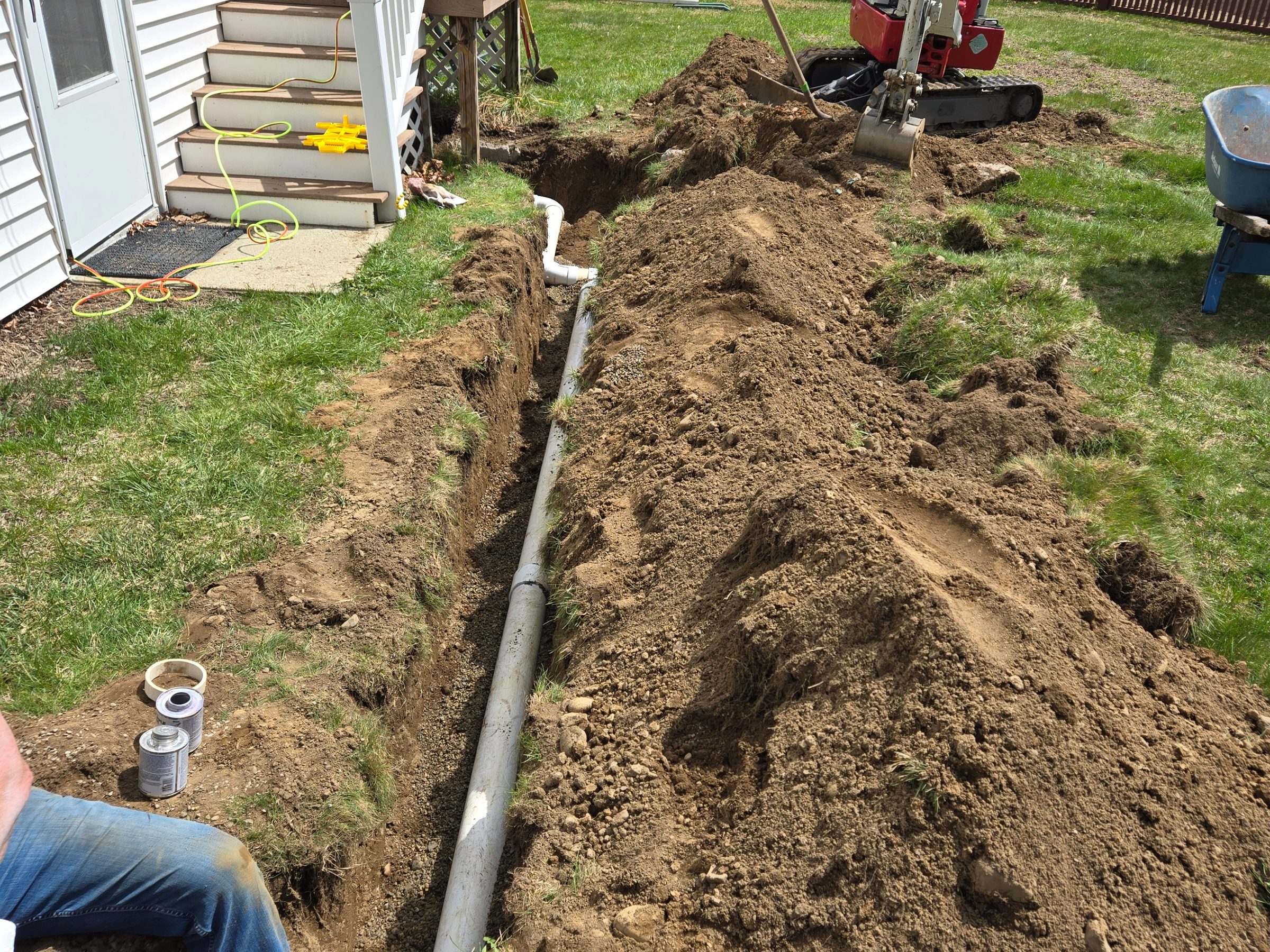 New service line laid in an excavated trench